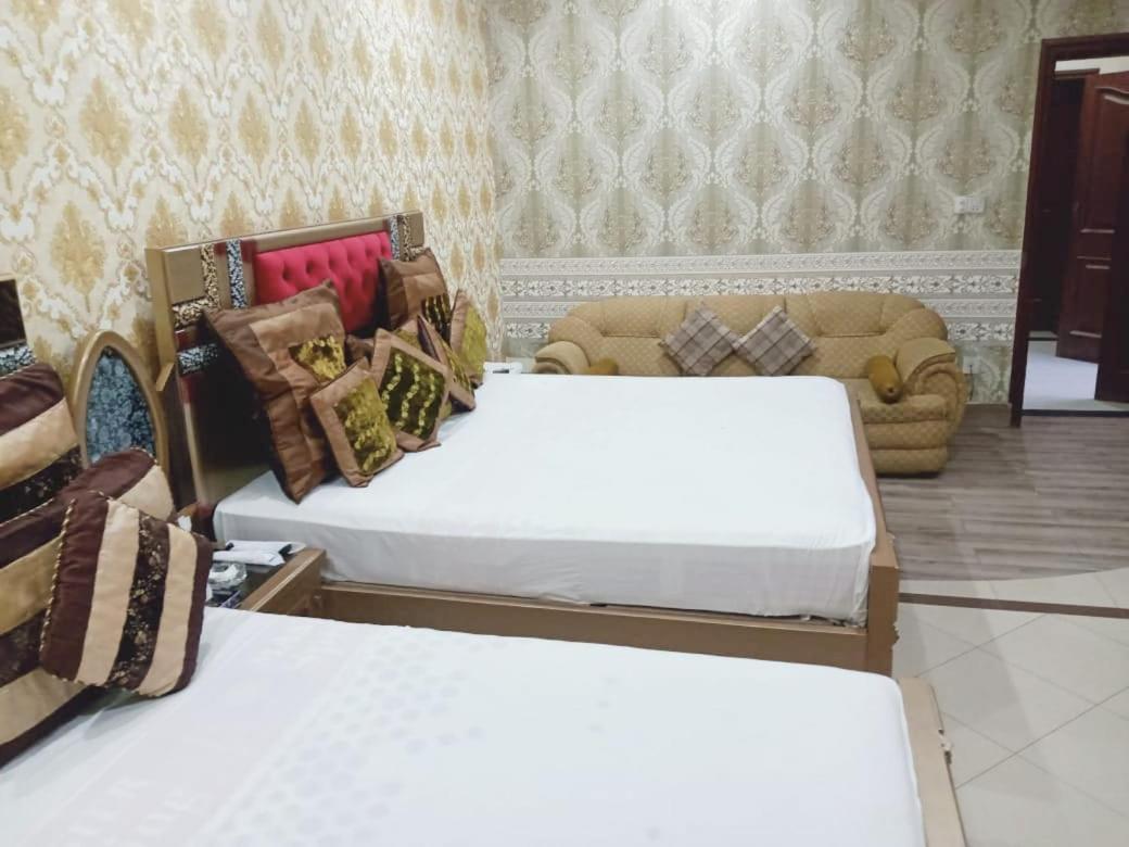Hotel Pak Continental Мултан Екстериор снимка