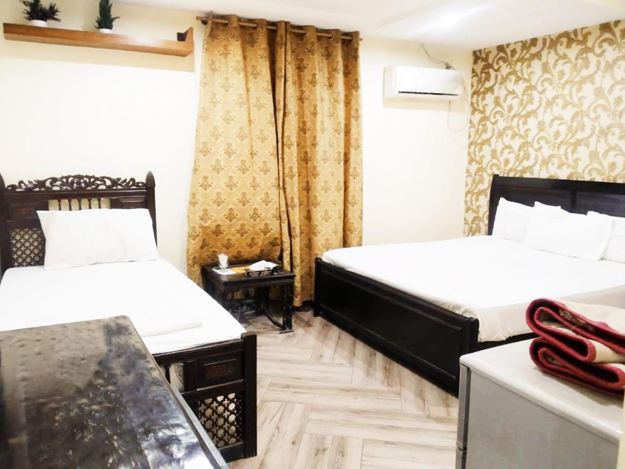 Hotel Pak Continental Мултан Екстериор снимка